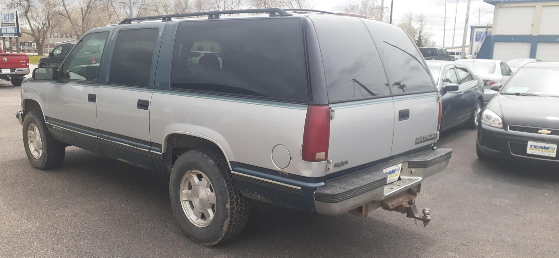 1995 Chevrolet Suburban K1500 4WD (1GNFK16K8SJ) with an 5.7L V8 OHV 16V engine, 4-Speed Automatic Overdrive transmission, located at 2015 Cambell Street, Rapid City, SD, 57701, (605) 342-8326, 44.066433, -103.191772 - CARFAX AVAILABLE - Photo#2